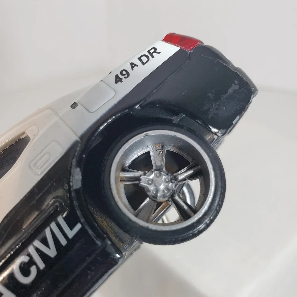 Jada Toys 2006 Dodge Charger Polícia Civil 1:32 Scale Die-Cast Model Car – Black
